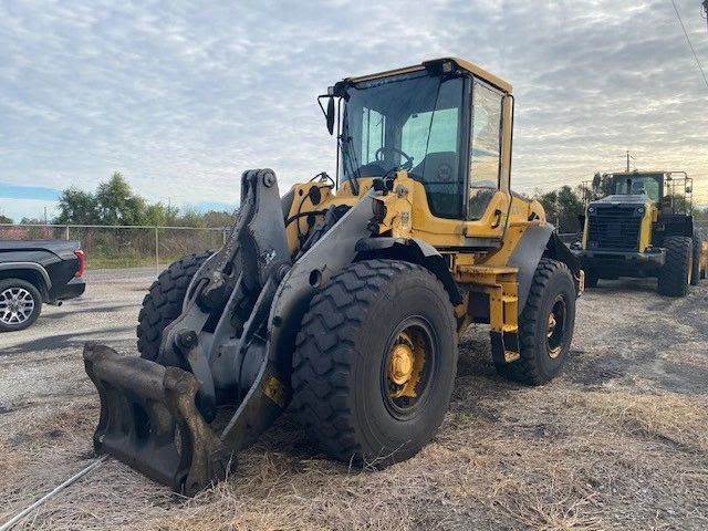2009 Volvo L70F w/Couple, Forks & Rake Attachments